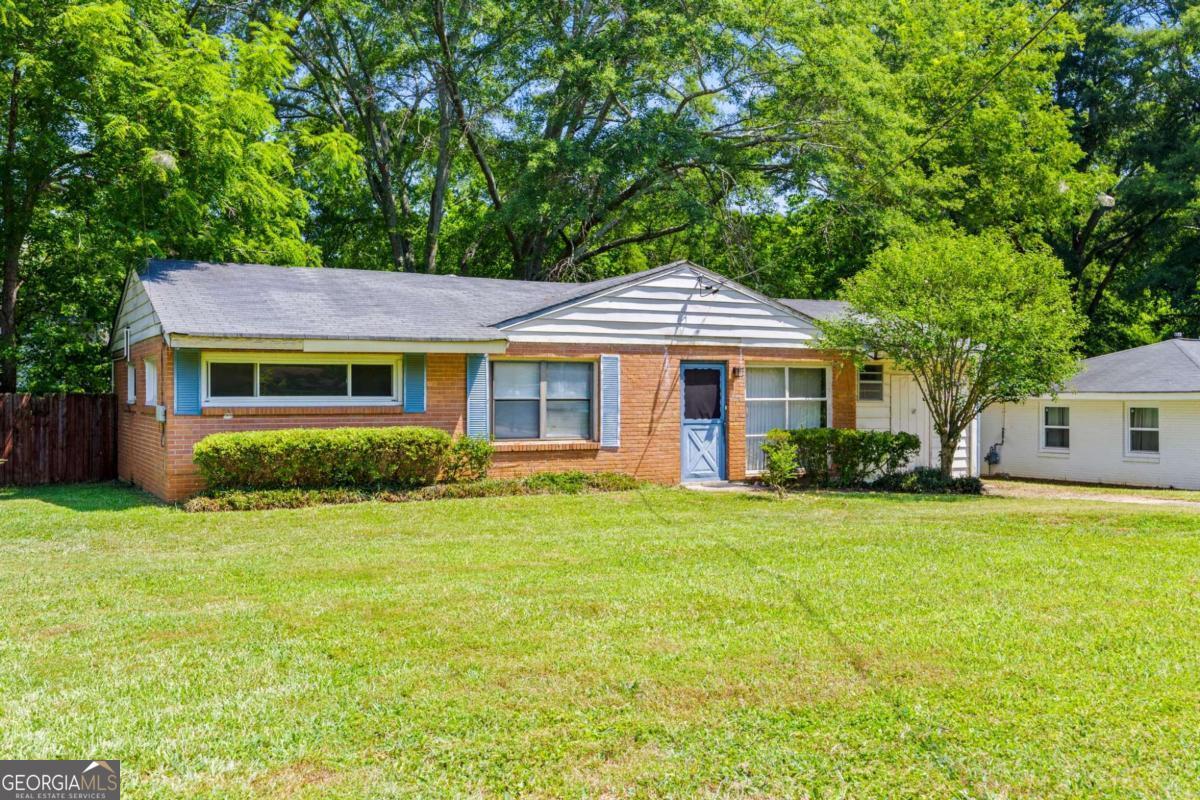 Great investment opportunity awaits with this charming brick ranch-style home in Valley Brook Estates! This home features 3 bedrooms and the carport area has been enclosed and added as an addition to the home. The large yard sits on an expansive 1/4 acre lot, ideal for outdoor activities or creating your dream garden. Conveniently located near highway access, Downtown Decatur, CDC, Emory, and various shopping areas, including the Lulah Hills development project. Don't miss out on this opportunity and a chance to own a home in an exceptional location. Offered "AS-IS" with no warranties.