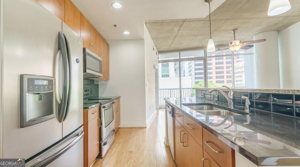 Photo of 44 Peachtree Place NW #728, Atlanta, GA 30309 (MLS # 10758911)