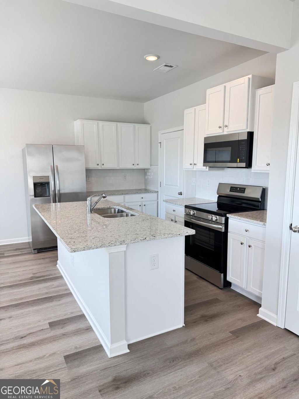 Photo of 11071 Suria Drive SE, Covington, GA 30014 (MLS # 10689846)