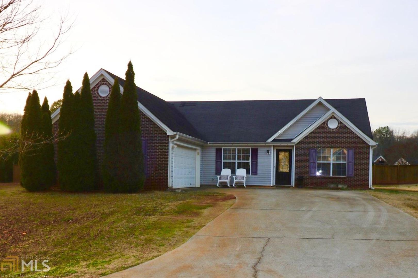 Great house in a well established neighborhood in Athens, GA. 2 years old laminate floor at living room. This property has a split bedroom floor plan which brings privacy to owners. Kitchen is big a easy to access from the living room and garage entrance. Bring your grill to BBQ at the back yard which is level and very private. Plenty of space back and sides of the property. The Garage is used as an office which has its individual split A/C system. Bring your own touch and call this property your home!