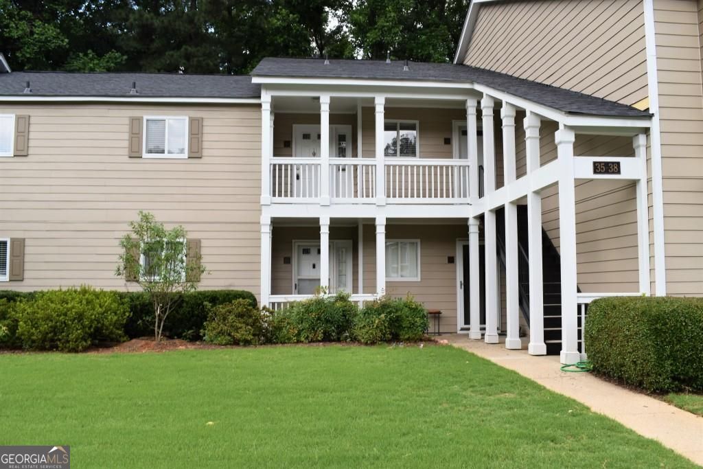 Spacious Updated condo in sought after Hillsdale Swim/Tennis Community in Smyrna! Conveniently located . This private home features 2 Bedrooms and 2 Baths, Double Vanities in Master Bath, Entire home Freshly Painted, remodeled kitchen with walk in pantry, hardwood floors, granite counters in bath, family room with fireplace, separate dining room, private screened porch with storage. All appliances remain for Tenant's use. Water and trash included in rent