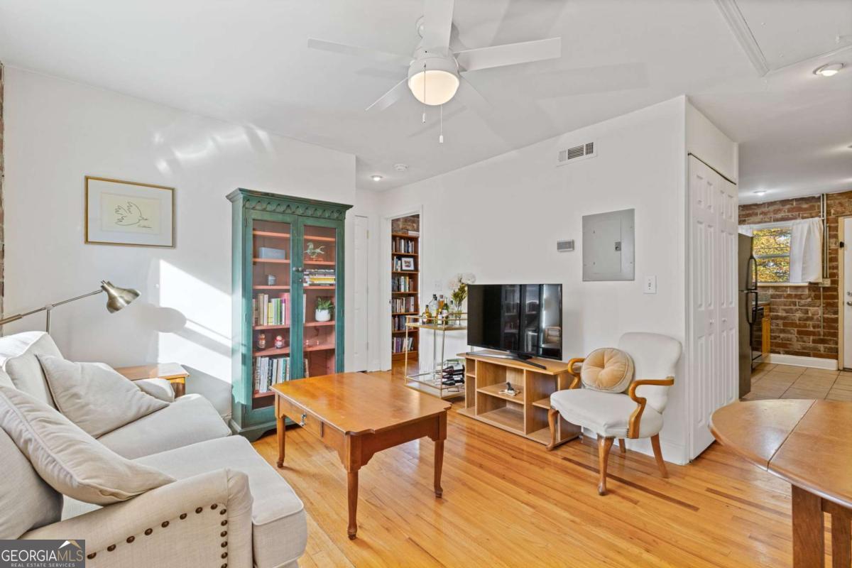 Welcome to your ideal intown one-bedroom retreat, just steps from the renowned Atlanta Beltline, offering unmatched convenience and urban connectivity. Enjoy the top-floor location featuring charming hardwood floors, exposed brick walls, granite countertops, a newer HVAC system, a new hot water heater, attic storage space, and a freshly tiled bathroom wall. Despite being in a vibrant area, find peace and tranquility on your balcony, perfect for enjoying city views with your morning coffee or evening relaxation. The property includes deeded/gated parking, and a brand-new washer and dryer. The area boasts phenomenal shopping and dining options, with nearby restaurants like Krog Street Market, Staplehouse, Marcus Bar & Grill, Pisces, and Chrome Yellow Coffee Shop within walking distance. Enjoy a short bike ride to attractions such as Piedmont Park, Oakland Cemetery, the High Museum of Art, and the Atlanta History Center. Additionally, the nearby MLK Jr Recreation and Aquatic Center offers a 25-yard lap pool, gym, track, climbing wall, and basketball courts.