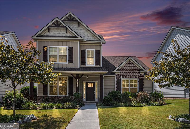 Step into this charming home where a welcoming two-story foyer opens to a bright and spacious living room filled with natural light. The main level boasts a formal dining room with elegant coffered ceilings and a gourmet kitchen featuring custom cabinetry, a large island, granite countertops, tile backsplash, and double ovens - perfect for gatherings and entertaining. Also on the main floor, you'll find a convenient laundry room and a private owner's suite with a spa-like bath offering a soaking tub, separate shower, dual vanities, and an expansive walk-in closet. Upstairs, two additional bedrooms and a versatile loft provide plenty of space for family, guests, or a home office. Beautifully landscaped grounds enhance the home's curb appeal and create a peaceful setting. With low-maintenance living and an ideal location just minutes from shopping, dining, and recreation, this home combines comfort, style, and convenience.