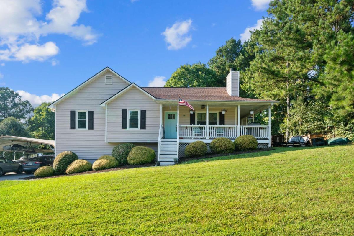 Welcome to your farmhouse-style home! This charming home boasts a beautiful wraparound front porch that invites you to relax and take in the quiet evenings sipping sweet tea. As you step inside, you'll be greeted by a warm and inviting atmosphere. The updated interior features butcher block countertops, creating a perfect balance of modern convenience and classic farmhouse charm. The spacious backyard provides a private oasis where you can entertain guests, host barbecues, or simply unwind and enjoy the peaceful surroundings. With ample space for gardening and outdoor activities, this backyard is a true gem that will inspire your creativity and bring your outdoor dreams to life. This updated raised ranch style home has been lovingly maintained and updated to include modern conveniences for the family with the laundry on main level and an additional in-law suite in the basement. Whether you're looking for a family home, or a peaceful retreat, this beautiful home is the perfect place to call your own. Don't miss out on this incredible opportunity to own your dream home!