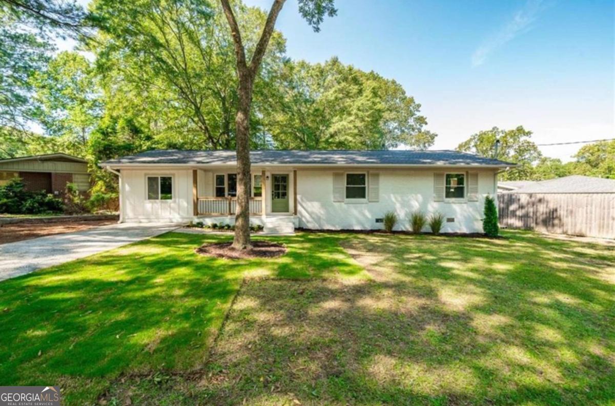 Welcome to 925 Stephens Street - the fully remodeled Smyrna ranch you've been waiting for! Just a short walk to Smyrna Market Village, this 3-bedroom, 2-bath home has been completely upgraded inside and out. This home sits on over a quarter-acre lot with a fully fenced backyard. Step inside to find high-end finishes throughout, including quartz countertops, beautifully tiled bathrooms, and an open, inviting floor plan. Major updates include a completely redesigned primary suite, fully renovated kitchen and bathrooms, brand new roof, HVAC, windows, electrical, plumbing, and insulation. Not a single detail was overlooked in this renovation and the home is even more stunning in person. Don't miss the chance to make this your new home and enjoy the very best Smyrna has to offer!