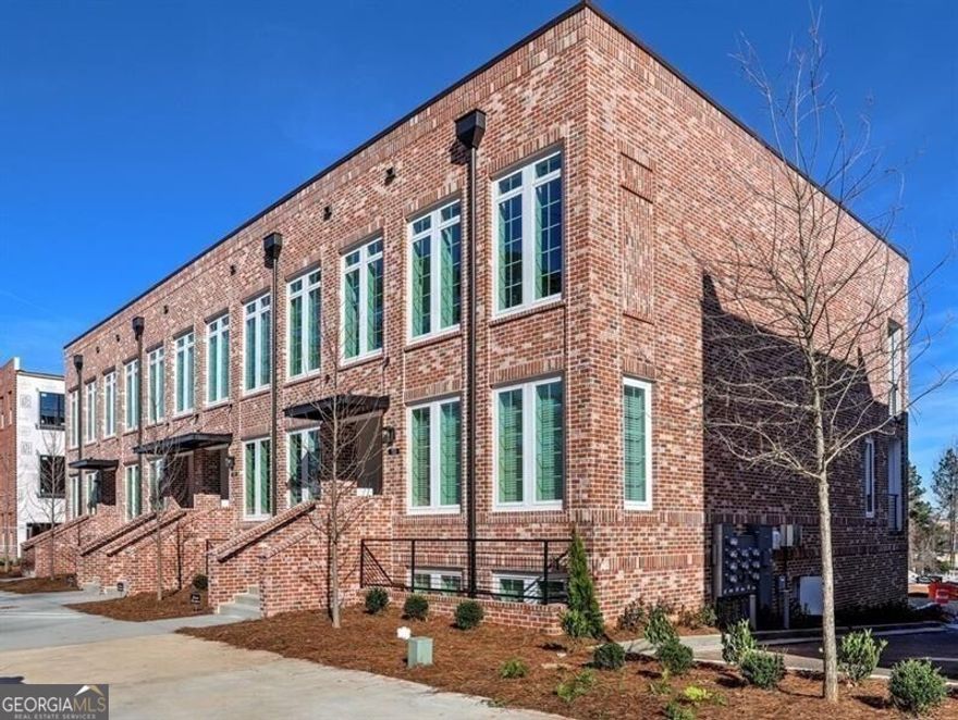New construction luxury condo at The Maxwell, a well designed new community located just steps away from Downtown Alpharetta and Avalon and direct access to the Alpha Loop and City Trail. The Maxwell neighborhood offers a Luxury Pool with Cabana, Bocce Ball court, open park areas with fire pits/BBQ and The Maxwell Retail Area with restaurants and shops . This end unit boasts an open concept plan with plenty of natural light and no one living above you. Kitchen with breakfast island features quartz counter tops, stainless steel appliances, plenty of cabinets with soft close doors and drawers, under cabinet lighting and single bowl kitchen sink. Spacious living/dining room opens to a cozy covered porch/patio overlooking the community. Small den or office can be used as a 2nd bedroom. 1 car garage with an extra parking space on the driveway and plenty of street/guest parking. Fridge, washer, dryer and Skybell front door monitor are included. Enjoy all what the Alpharetta lifestyle has to offer!