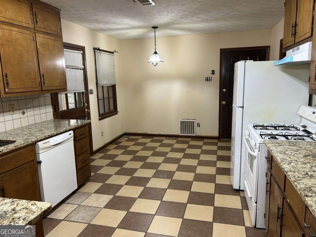 Photo of 1530 OLEANDER Lane SW, Lilburn, GA 30047 (MLS # 10626067)