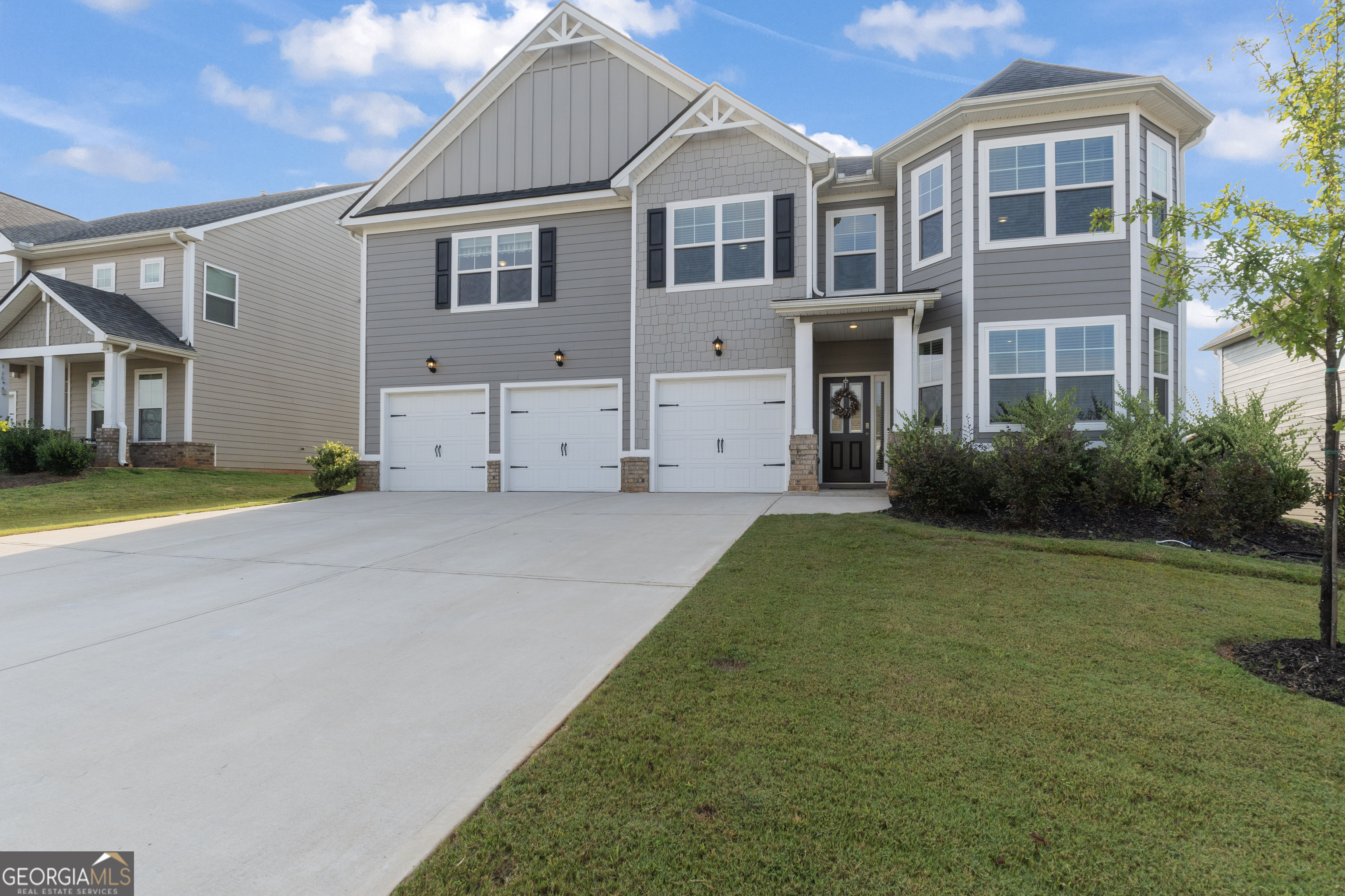 Welcome to this beautifully maintained, nearly new home in the highly desirable gated community of Madison Lakes in Madison, GA. Built just 3 years ago, this spacious 6-bedroom, 3.5-bath home offers the perfect blend of comfort and functionality, featuring a gourmet kitchen with ample cabinetry, stainless steel appliances, a walk-in pantry, and an open-concept layout flowing into a large living room with coffered ceilings and a gas fireplace. The main floor includes the luxurious owner's suite with a spa-like bathroom and walk-in closet, plus a flexible office/playroom space. Upstairs, you'll find five generously sized bedrooms, two full baths, and a versatile loft currently used as a theater room-projector included! Enjoy outdoor living with a fully fenced backyard and large deck, plus a 3-car garage. Madison Lakes offers resort-style amenities including a pool, tennis courts, playground, clubhouse, and fitness center, all just minutes from I-20 and under 6 miles from charming Downtown Madison-this is the perfect place to call home!