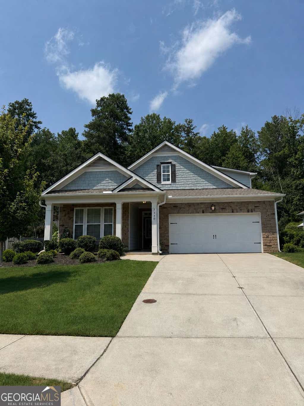 Photo of 7530 Rambling Vale, Cumming, GA 30028 (MLS # 10815036)