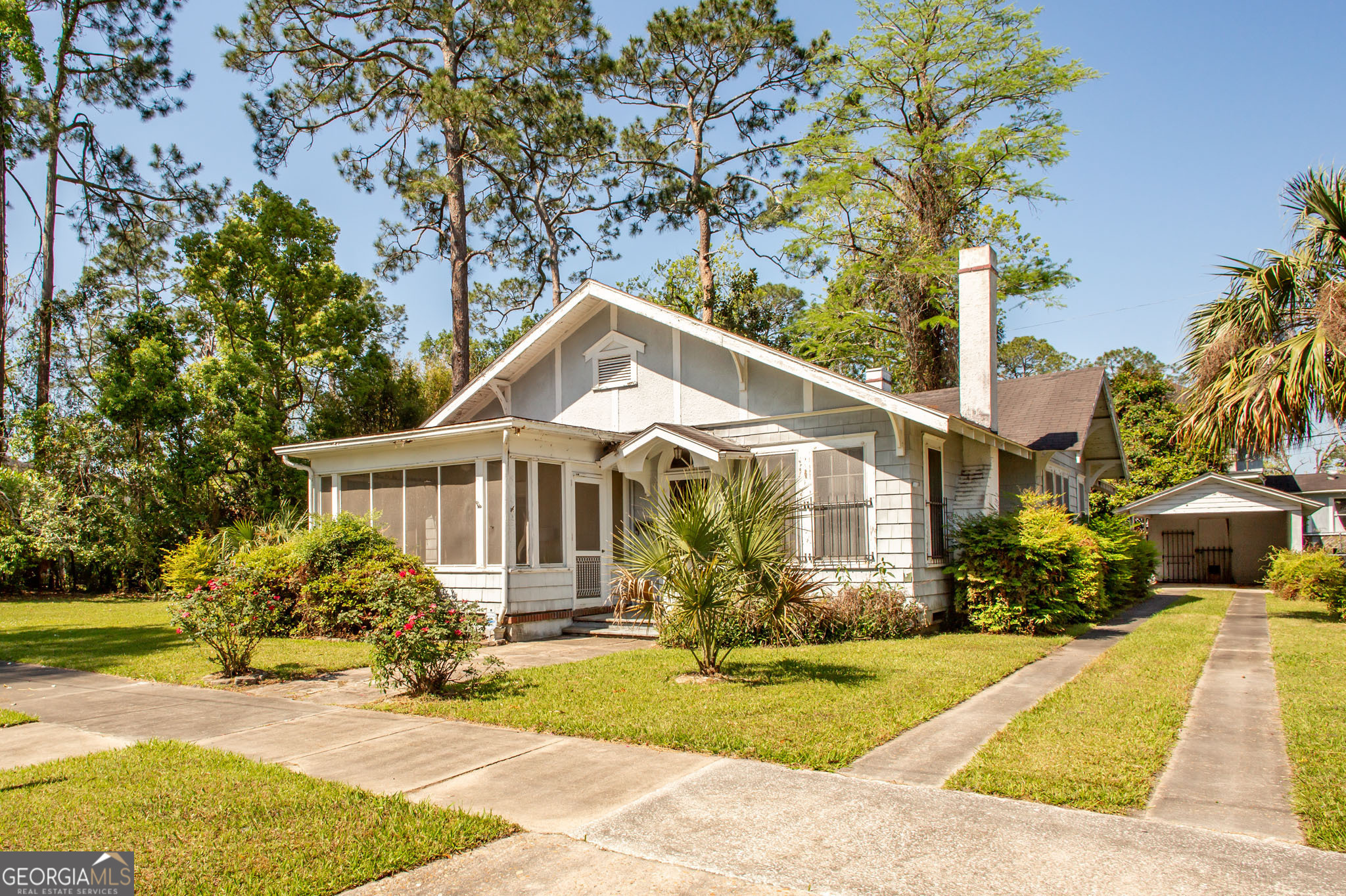 Charming 1900 Traditional Home with Modern Comforts Welcome to 617 Ware St., a classic gem nestled in the heart of Waycross, GA. This stunning 1900 traditional-style home effortlessly blends historic character with modern convenience. Featuring 3 spacious bedrooms and 2 full baths, this home offers plenty of room for family and guests alike. Step inside to discover beautifully preserved original hardwood floors that flow throughout the home. The formal dining room and cozy breakfast room provide options for hosting meals and gatherings, while two separate living areas allow space for relaxation or entertaining. The screened-in front porch invites you to enjoy serene mornings and peaceful evenings, perfect for sipping coffee or unwinding after a long day. Outside, the generously sized lot offers endless possibilities for gardening, recreation, or simply enjoying the outdoors. A detached carport adds functionality and convenience, making this home as practical as it is charming. Don't miss the opportunity to own a piece of history! Schedule your private tour today!