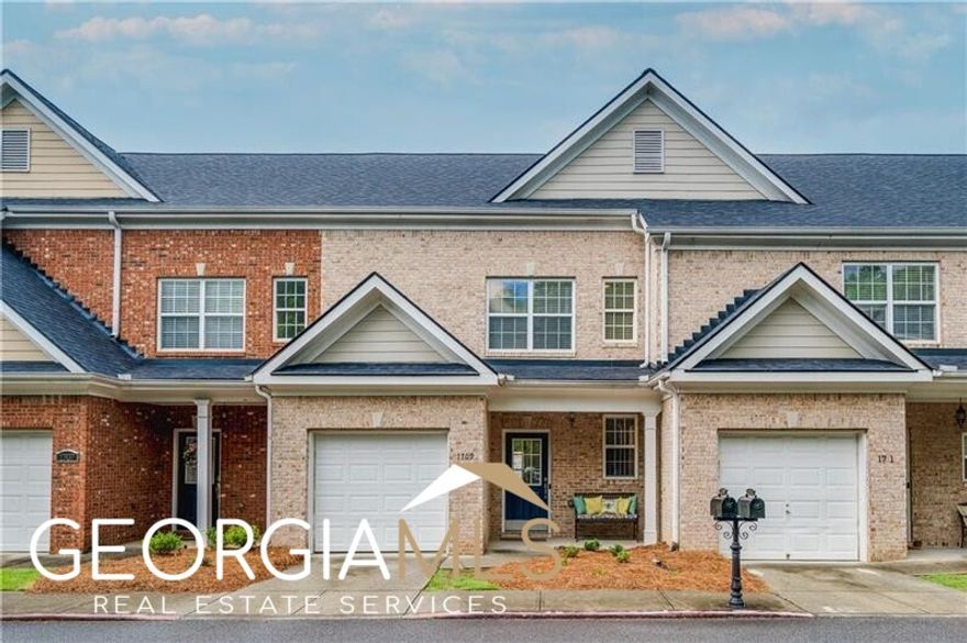 You will love this well cared for immaculate three bedroom townhome in Kennesaw. All new interior paint and newly installed LVP flooring throughout the main level. Stainless appliances in kitchen with a brand new range plus plenty of cabinet space and granite countertops. Open concept with the family room, kitchen and dining area makes entertaining here easy. Private patio that is fenced and a nice place to relax. HOA just installed new roofs for entire building. One car kitchen level garage for parking and with nice storage as well. Second level features primary suite with large walk-in closet and attached bath with separate garden tub and shower. Two nicely sized secondary bedrooms rooms with a secondary bath. Parking for guests is across the street and is plentiful and pool/tennis is just down the street. Conveniently located off Barrett Pkwy with shopping and restaurants only minutes away. (Whole Foods, Academy Sports, Starbucks and so much more)