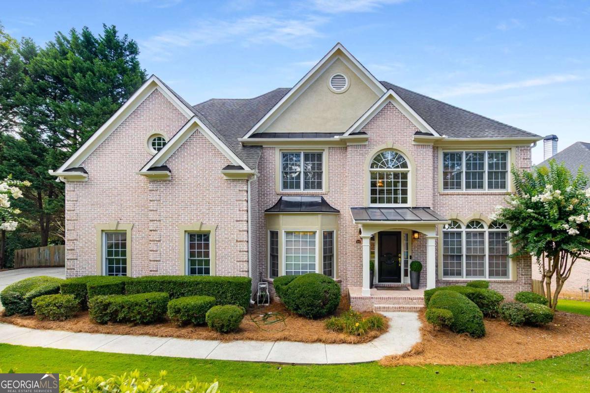 Stately 4-Sided Brick Home with Resort-Style Pool in Mableton This beautifully maintained 6-bedroom, 4.5-bathroom estate offers luxurious living just minutes from Smyrna. The grand entry welcomes you with an open floor plan, gleaming hardwood floors, and elegant details like crown molding, columns, and tray ceilings. The formal living and dining rooms exude sophistication, while a dedicated office provides a quiet workspace. The heart of the home is the stunning family room, featuring a marble-surround fireplace, built-ins, and soaring 20-foot ceilings with half-moon windows that flood the space with natural light. The gourmet kitchen boasts white cabinetry, granite countertops, stainless steel appliances, a breakfast bar, and a walk-in pantry-plus a brand-new double convection oven. A charming pass-through connects the kitchen to the cozy sunroom (with its own fireplace) and living room, making entertaining effortless. Upstairs, the spacious primary suite impresses with vaulted ceilings, a double vanity, two walk-in closets, and a relaxing gas fireplace. Three additional bedrooms and well-appointed bathrooms complete the upper level. The fully finished basement is an entertainer's dream, featuring two extra bedrooms, a full bathroom, and a flexible open space with a kitchenette-perfect for hosting poolside gatherings. Step outside to your private, resort-like backyard with a sparkling pool and spa (recently updated with new equipment), a brand-new deck, and professional landscaping. Prime Location Near Smyrna's Best Amenities Enjoy easy access to Smyrna's vibrant lifestyle, from the annual Taste of Smyrna festival to bustling shopping districts and diverse dining. Outdoor enthusiasts will love the nearby parks, trails, and the Silver Comet Trail, while city attractions like Truist Park, Georgia Aquarium, and Six Flags Over Georgia are just a short drive away. Downtown Smyrna's Market Village and Village Green-home to the library, arboretum, and community events-add to the area's charm. With fresh interior and exterior paint, updated HVAC systems, and a water heater under five years old, this move-in-ready home blends elegance, comfort, and convenience. Don't miss your chance to own this exceptional property!