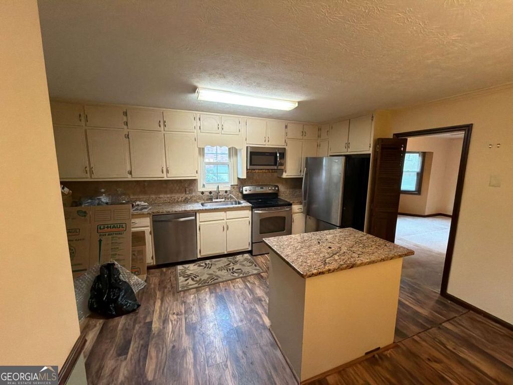 Photo of 4445 Lake Forest Drive, Oakwood, GA 30566 (MLS # 10741858)