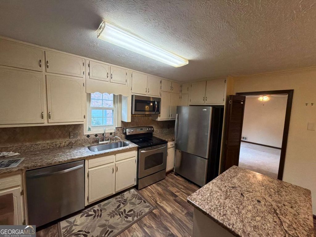 Photo of 4445 Lake Forest Drive, Oakwood, GA 30566 (MLS # 10741858)