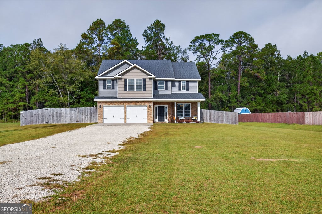 Photo of 233 Cypress Creek Drive NE, Ludowici, GA 31316 (MLS # 10873777)