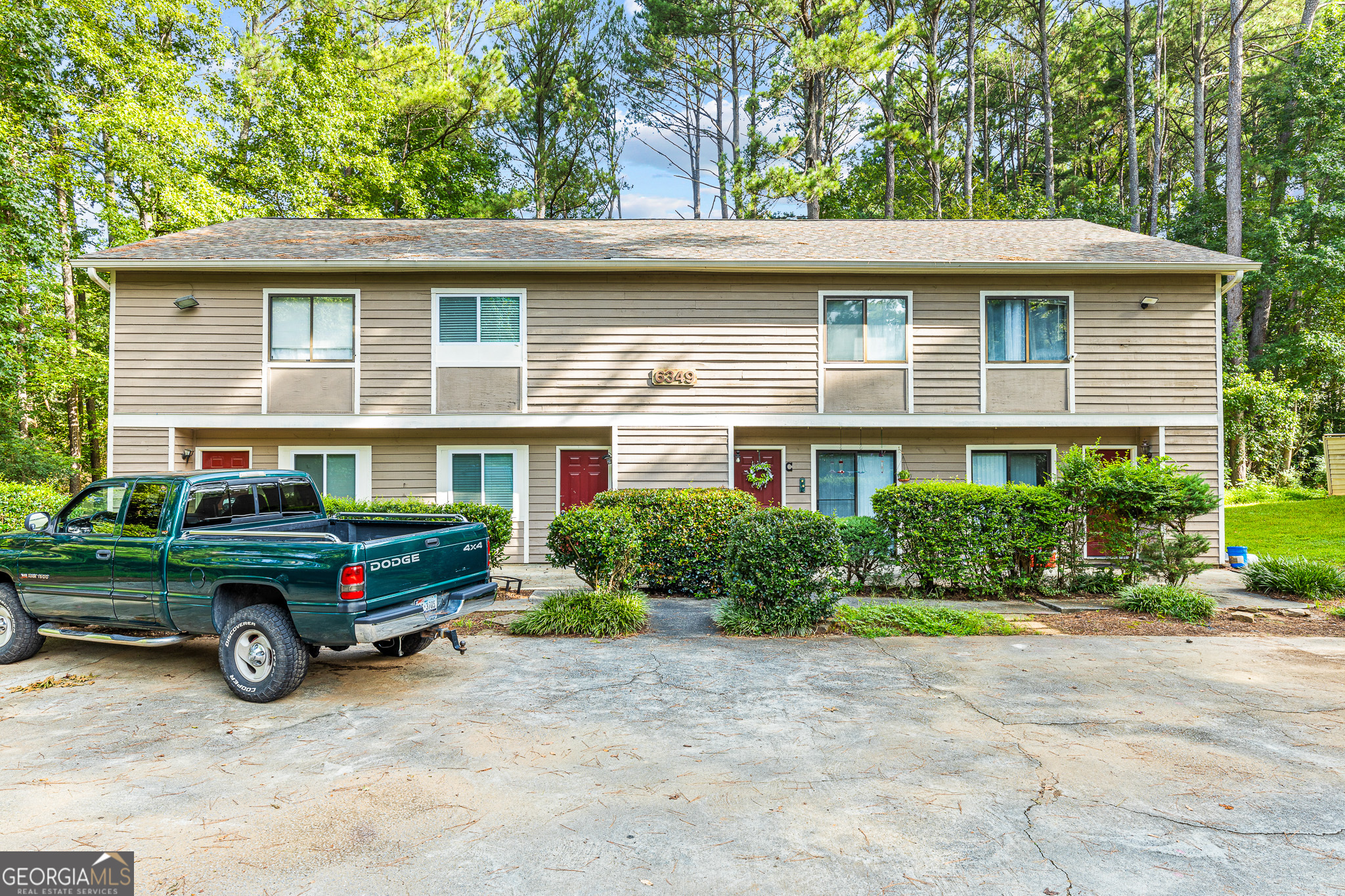 6349 Holcomb Way Unit B. This newly renovated 2-bedroom, 2.5-bathroom townhome with FENCED BACKYARD is conveniently located in Peachtree Corners. **WATER INCLUDED** (tenant does not pay a water bill). Just off Holcomb Bridge Road a short distance from the new Peachtree Corners Town Center. This home is close to restaurants and shopping. Walk inside Unit B to the front room which can be a dining room, a small sitting room, or even your office. The functional galley kitchen connects the front room to the living room. You'll love the mosaic backsplash. Completing the first floor is the living room at the back of the unit. A decorative fireplace and mantle accent this large and cozy room. There's a small fenced in patio space out back where you can sit outside and enjoy the peace and quiet. There's also a small wet bar in the living room, plus a powder room in the hallway. Upstairs is a roommate floorplan where each of the two bedrooms have a full bathroom. There's LVP flooring throughout the upstairs, with plenty of natural light, closet space and the small bedroom has a walk-in closet. Both bathrooms are renovated with updated vanities, painting, and fixtures. Washer and dryer hookups are conveniently upstairs. Excalibur Homes does not advertise on Facebook or Craigslist. Be advised that the sq ft and other features provided may be approximate. Prices and/or availability dates may change without notice. Lease terms 12 months or longer. Application fee is a non-refundable $75 per adult over 18 years of age. One-time $200 Administrative fee due at move-in. Most homes are pet-friendly. Breed restrictions may apply. Rental insurance required.