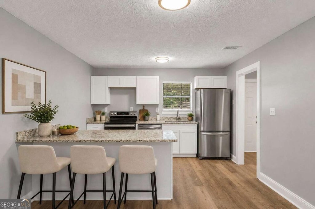 Photo of 1677 Liberty Valley, Decatur, GA 30032 (MLS # 10867732)