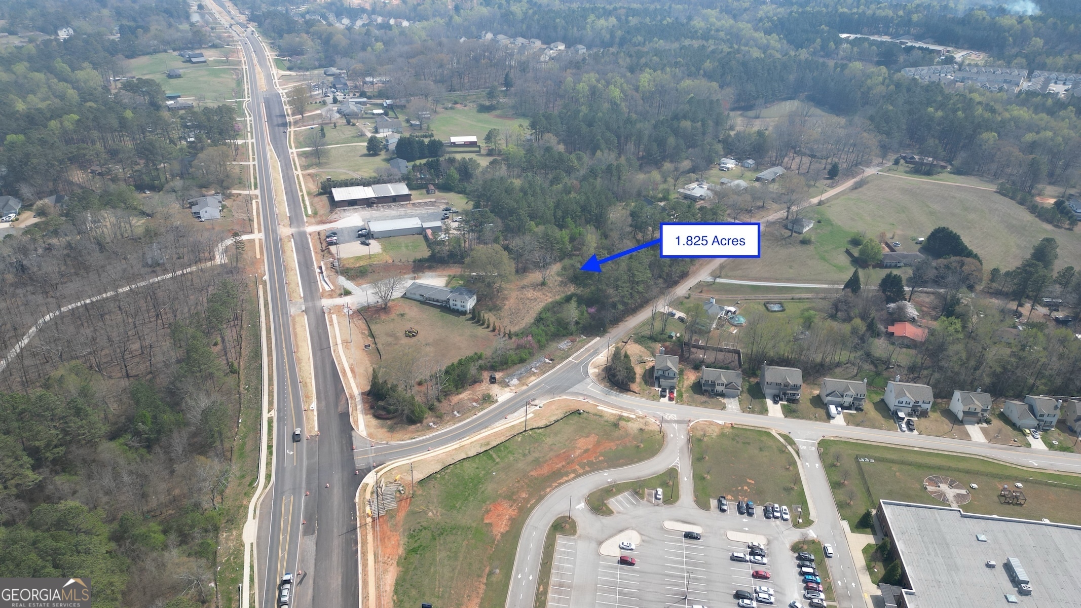 This 1.825 acre commercial parcel is zoned B-1 (General Business District) which allows for many potential uses including retail, office, restaurant, medical, and more. Located across from P.B. Ritch Middle School, this property also has visibility from newly widened Macland Road and sits less than 1,500 feet from Hwy 120 (Charles Hardy Pkwy). With the Dallas Costco only a mile away and the Wellstar Paulding Hospital on Hwy 278 only 1.5 miles away, this area's explosive growth is bringing commercial development to every available tract in the area and makes this location a prime spot to secure your place while it's still available!
