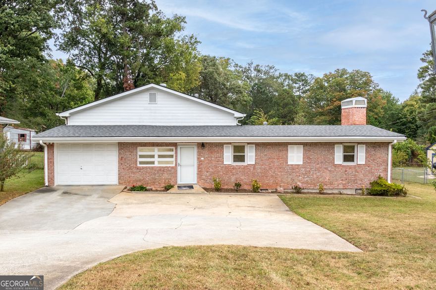 Welcome to 2726 Chamblee Tucker Road - a well-maintained 3 bedroom 2 bath home featuring large dual primary bedrooms, vaulted ceilings with exposed beams, and a spacious kitchen. Enjoy a two-car garage, two storage buildings, and a beautifully landscaped backyard with a basketball goal. Conveniently located near restaurants, shopping, and major highways. This versatile property offers comfort, space, and an excellent location close to everything the Atlanta area has to offer.