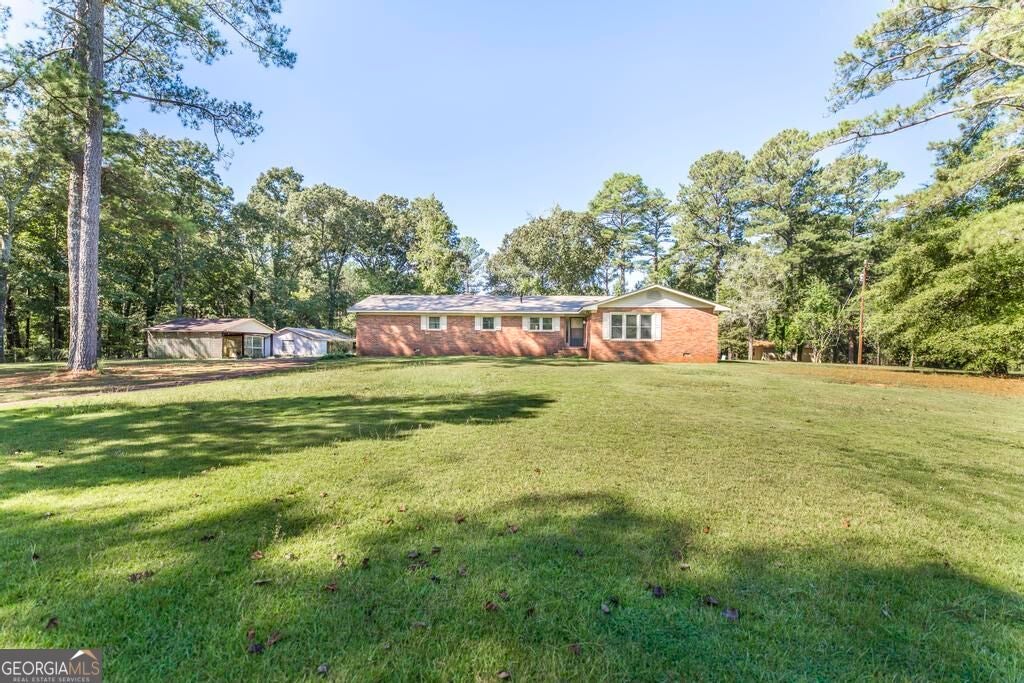 Photo of 1226 Rainey Road, Macon, GA 31220 (MLS # 10869924)