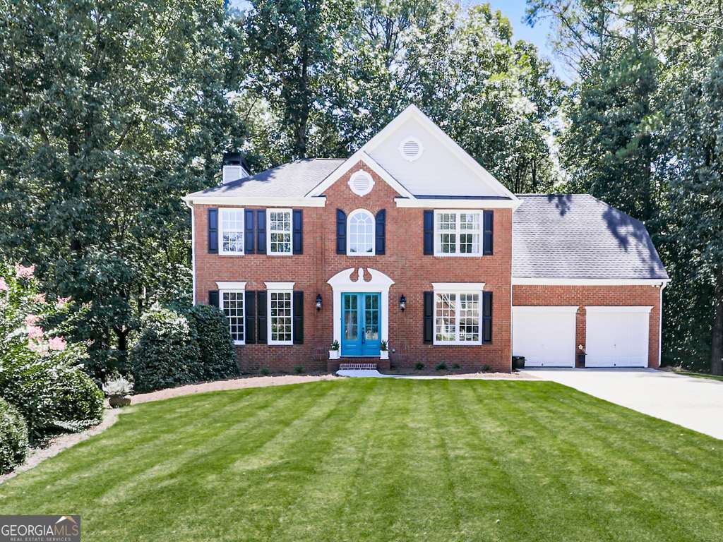 Totally remodeled, 4 bed, 3 1/2 bath home on full, finished basement perfect for In-Law Suite on a cul-de-sac in sought after Towne Lake Swim/Tennis neighborhood. This beautiful home has been extensively remodeled from top to bottom-truly move-in ready and better than new! Featuring 4 bedrooms, 3 1/2 baths, and a finished basement with a potential In-Law Suite, this home offers modern style, fresh finishes, and flexible living space in one of Towne Lake's desirable swim/tennis neighborhoods. Step through elegant French entry doors into the dramatic, 2 story Foyer to find a bright interior with updated LVP flooring, fresh, neutral paint, with stylish lighting throughout. At the heart of the home is an updated Kitchen with stainless steel appliances, cooking island, custom sink, pantry, upgraded cabinetry, designer backsplash, and Breakfast room. The Kitchen and Breakfast area open to the large Family room with elegant fireplace with gas logs. The Family room opens onto a large, new back deck overlooking the very private, wooded back. There's a separate Living room that can be used for entertaining, office, or flex space. The Separate Dining room has heavy crown molding, elegant chair rail and plenty of room to entertain guests. The long windows and 9 ft smooth ceilings on the main floor create lots of bright, open living space. Upstairs, the oversize Master Suite has also been updated and features a tray ceiling and crown molding. The beautiful Master bath was recently remodeled with tile floor, quartz countertop, all new fixtures, elegant soaking tub, separate shower with penny tile floor, separate toilet area, vaulted ceiling and large Walk-In closet. The Secondary bedrooms are roomy and bright and every secondary bathroom has been tastefully renovated with today's finishes and fixtures. The large Laundry room is located on the 2nd floor for convenience. The full, finished basement provides a light and bright living area with a 3rd full bath and plenty of space for an In-Law/Teen Suite. Stylish "barn doors" here close off space for a potential 5th bedroom. In the spacious garage you'll find a tile floor that provides a more finished look. Outside, you'll enjoy the fresh, neutral exterior paint and cement-based siding for ease of maintenance. This home is conveniently located near excellent schools, shopping, dining, entertainment, and quick access to I-575 for ease of commute. This house is truly special. Come see for yourselves. You'll be glad you did!