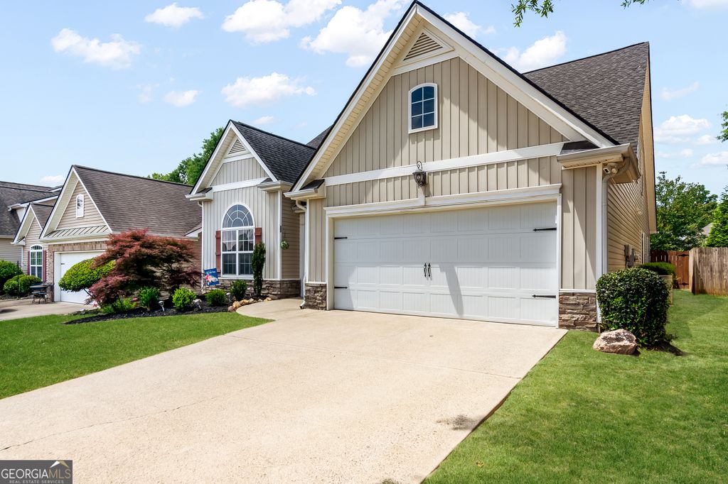 Photo of 129 Village Drive, Canton, GA 30114 (MLS # 10769529)