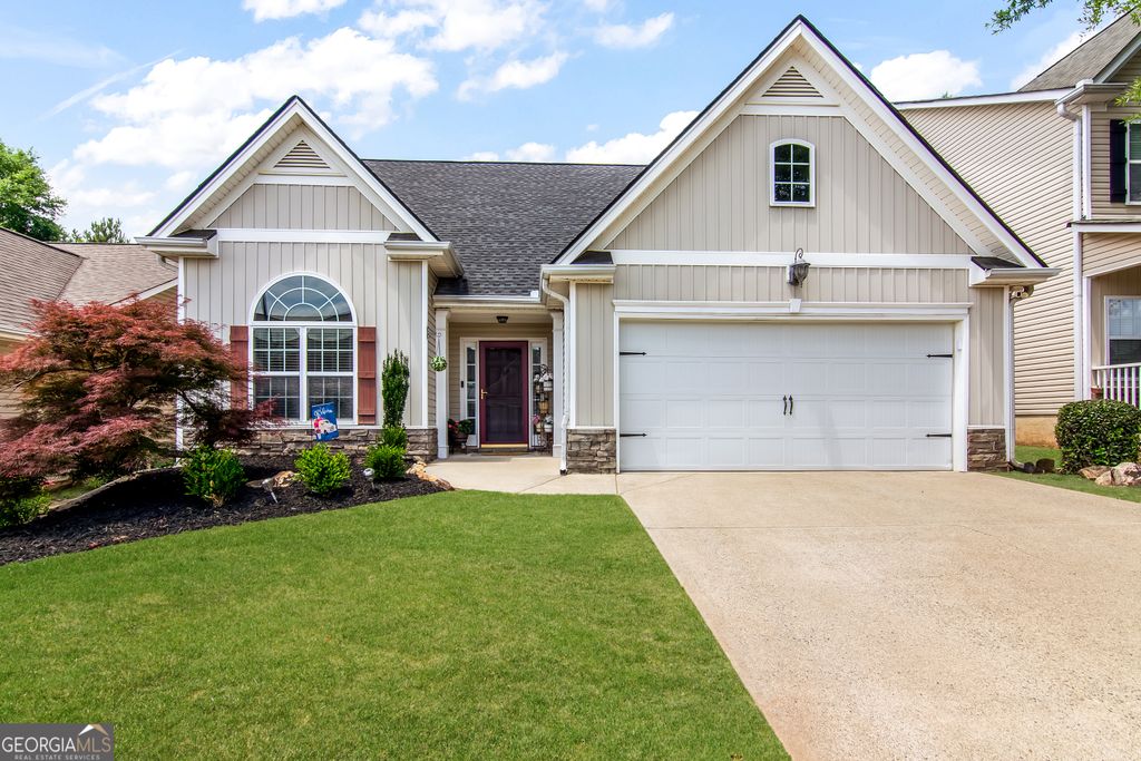 Photo of 129 Village Drive, Canton, GA 30114 (MLS # 10769529)