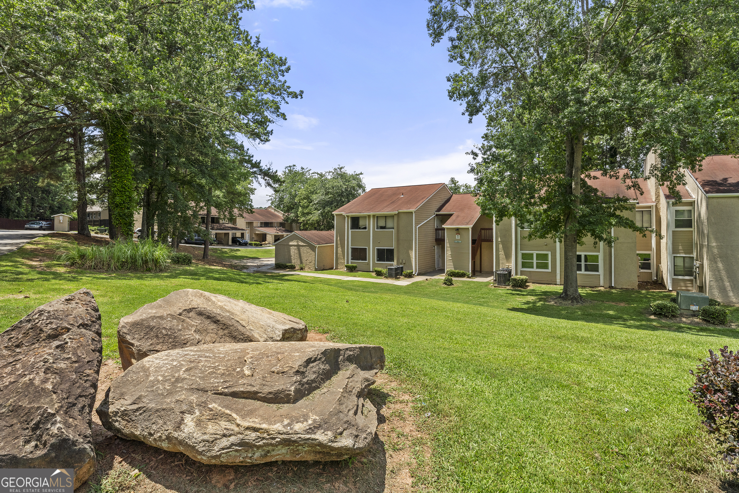 Spacious 4BR 2 Bathroom condo. Large living area with decorative "fireplace" and nook that could be used as wet bar or additional storage close to entry. Large dining area with room for a six-chair table. Walk out patio with French doors. Fresh paint and blinds throughout, screened/security entry doors on patio and entry. All stainless refrigerator, range and dishwasher included, central Air. 4 large bedrooms each with overhead lighting all large enough for a king-sized bed, separate laundry room with extra space for storage. Security system is installed. Large, covered patio. Master includes walk in closet, sink/vanity area separate from toilet and shower. GREAT INVESTMENT PROPERTY. No leasing restrictions. Association is active and working on major improvements continually.
