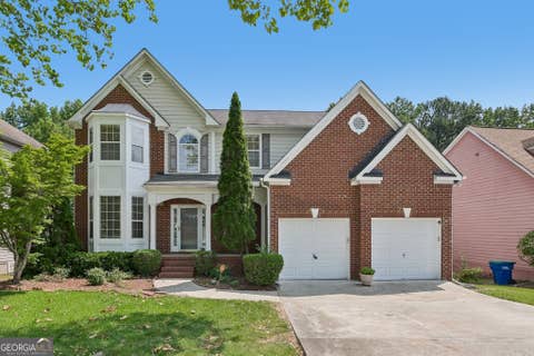 Photo of 6020 Riveroak Terrace, Atlanta, GA 30349 (MLS # 10782048)