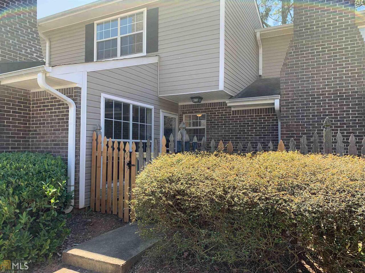 Completely renovated townhouse in Marietta. Gated Community. 2 bedroom, 2 Bath. Upgrades include new HVAC, new hot water heater, smooth ceilings, new designer paint, new lighting, new faucets in kitchen and baths, new low flow toilets, new LVT floors, and new Carpet & pad. Open floor plan w/ beautiful fireplace & Kitchen. Kitchen features new S/S appliance package and white cabinets with soft close hinges. Great location and a must see.