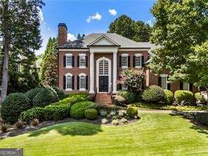 Welcome to this stunning 6-bedroom, 6-bathroom traditional home in the highly sought-after Walton school district. Thoughtfully updated throughout, every bathroom is newly renovated, and the home features a modern open-concept kitchen with an oversized island, Wolf gas cooktop, bar fridge, and dry bar-perfect for entertaining. The whole-home surround sound system extends from the kitchen and dining room to the master suite, basement, and outdoor living spaces. As a true smart home, lighting, security, and garage doors are all integrated with the Nest app, and even the garage is equipped with a Tesla charger. The finished basement offers a movie theatre, game room, bedroom, and updated bathroom, creating the ultimate space for family and guests. Step outside to your backyard oasis, complete with a beautifully landscaped yard, pool/spa, deck, and outdoor grill for year-round enjoyment. This home combines luxury, technology, and comfort in one of East Cobb's most desirable neighborhoods.