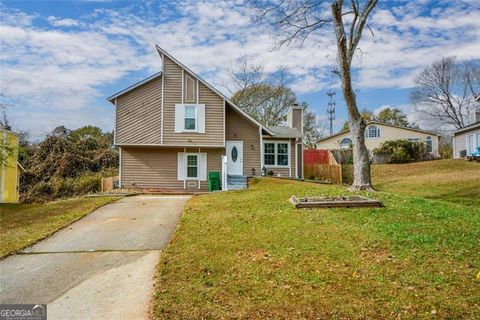 Photo of 1126 Mainstreet Valley Drive, Stone Mountain, GA 30088 (MLS # 10649144)