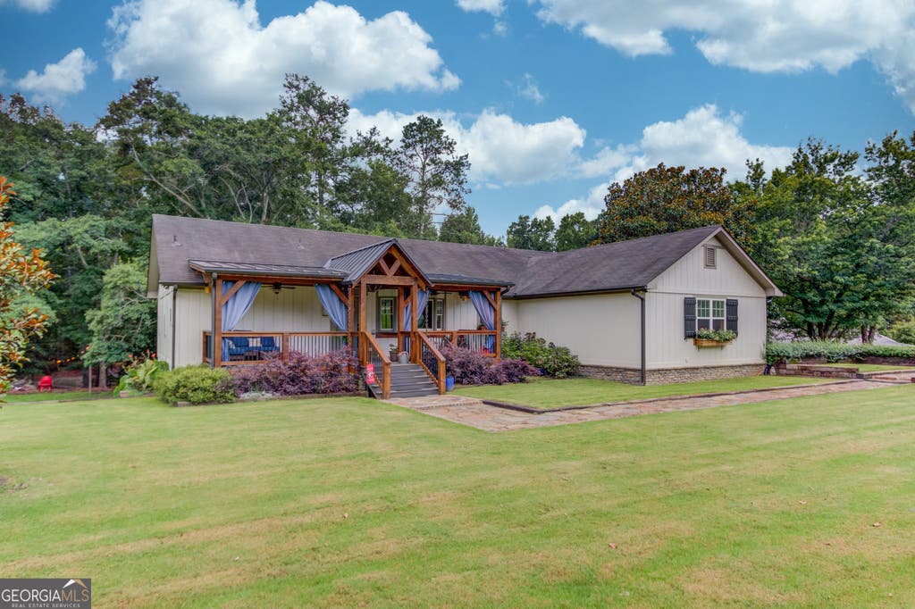 Photo of 8401 Norris Lake Way, Snellville, GA 30039 (MLS # 10808212)