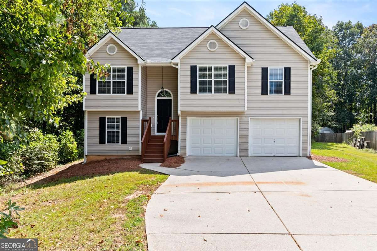 Welcome to Flowery Branch! This beautiful three-bedroom, two-bath home is perfect for a first-time homebuyer or for a family looking to downsize. Nestled at the end of a cul-de-sac, it offers a desirable split floor plan with a spacious living room ideal for entertaining. The eat-in kitchen features stainless steel appliances and plenty of room for family meals. The owner's suite is generously sized and includes a private bath with a separate shower, and a soaking tub. Two additional bedrooms and a full bath provide comfortable living space for the whole family. The lower level is unfinished and ready for your vision-whether you want to add a fourth bedroom, office, or family room, the possibilities are endless. Outside, enjoy a level, fenced backyard with plenty of space for kids and pets to play. Located in Hall County, this home is priced to sell-don't miss the opportunity to make it yours