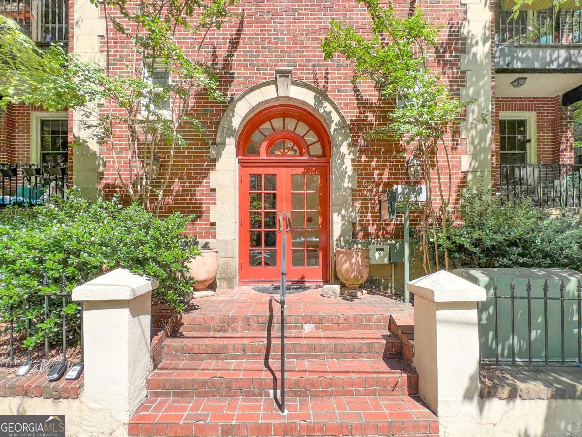 Charming Studio in the Heart of Virginia Highland Welcome to The Frederica-a classic brick condo building tucked into one of Atlanta's most walkable and vibrant neighborhoods. This light-filled studio blends historic charm with thoughtful design, offering a warm and welcoming place to call home. Exposed brick, hardwood floors, and oversized windows create an inviting, character-rich space. The efficient kitchen includes ample cabinetry, a full-size refrigerator, and a breakfast bar that opens into the main living area. A cozy nook offers the perfect spot for a desk, reading chair, or creative corner. The full bathroom features clean finishes and vintage flair. Enjoy peace of mind with a new HVAC system installed in 2023 and an in-unit washer/dryer set from 2021. Off-street parking adds to the convenience, making daily living that much easier. Whether you're looking for a first home, a low-maintenance retreat in the city, or a smart investment, this studio offers the perfect blend of charm, comfort, and location. Walk to the BeltLine, Ponce City Market, Piedmont Park, and all the shops, cafes, and restaurants that make Virginia Highland such a beloved neighborhood.