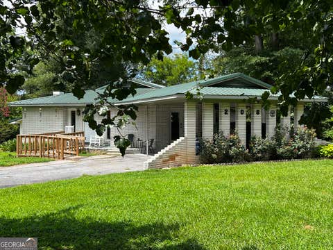 Photo of 208 Kentucky Drive NE, Calhoun, GA 30701 (MLS # 10820783)