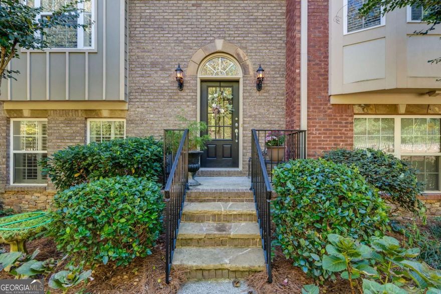 Beautiful move-in ready 4 bedroom 3 1/2 bath Townhouse within walking distance to all fantastic shops, restaurants, events and parks in Historic Norcross.  Open floor plan features LVP floors, kitchen w/ tons of cabinet space, stainless steel appliances, separate pantry, breakfast area, and island. Bright great room with marble fireplace surround. Primary suite on the upper level features double trey ceilings, two walk-in closets and a spacious bathroom with soaking tub and double vanity. One bedroom has been turned into a custom built art room/office, but can be returned to the 4th bedroom if needed.The lower level features a bedroom and full bath perfect for guests or roommate. The home also features a deck with ample space for a dining table and additional seating. Very well maintained and move in ready. Location! Location! Location!