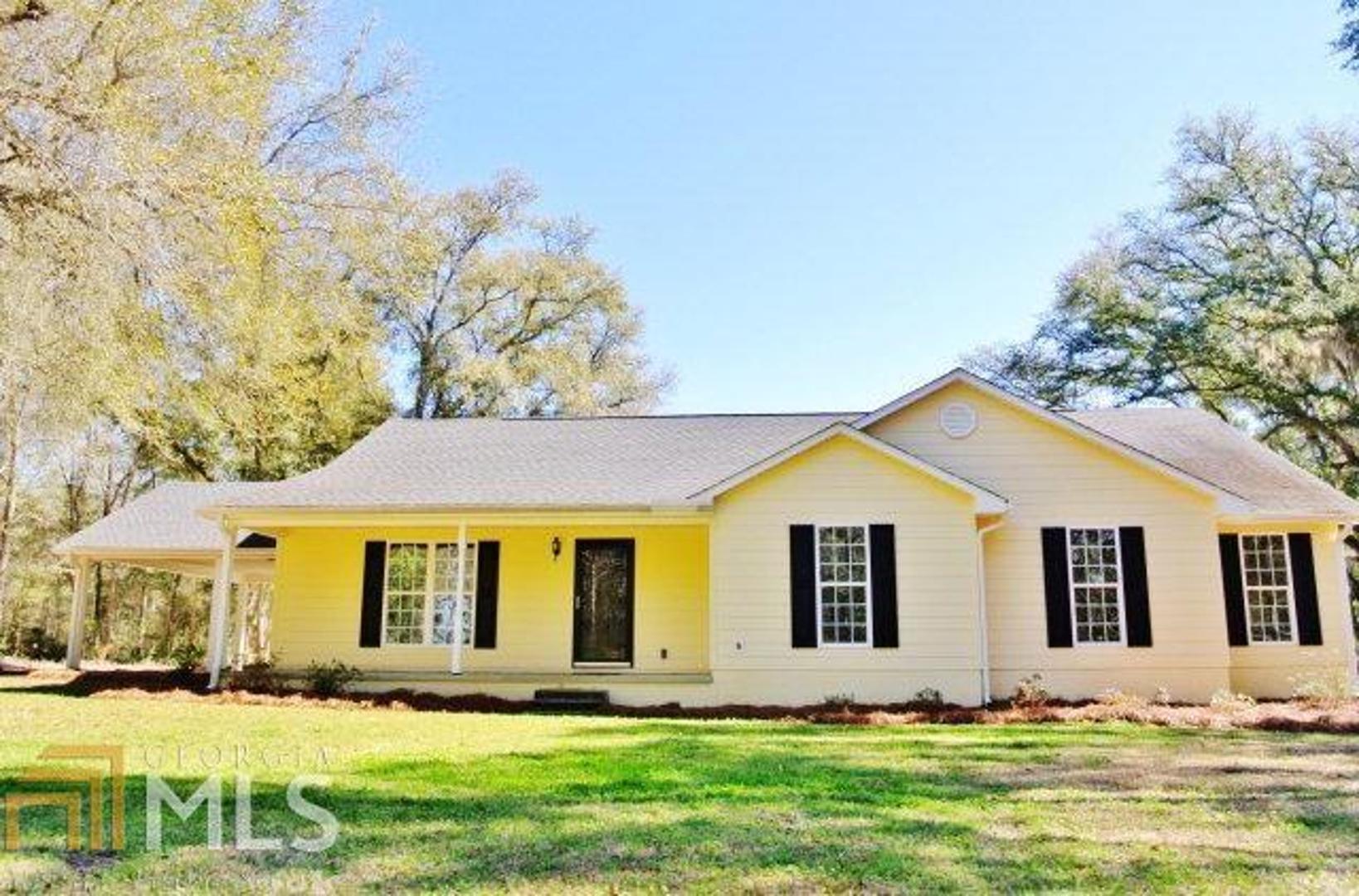 100% USDA financing available! AFFORDABLE COUNTRY LIVING YET ONLY MINUTES FROM TOWN! This cozy Lee County home is nested on nearly 10 wooded acres, featuring approximately 2,400 sq ft of living space- 4 bedrooms- 2 full baths! The kitchen has a great open floor plan with an island, stainless appliances, nice hardwood floors, an eat-in dining area and open den w/ a wood burning fireplace. There is also a VERY LARGE great room which also has pretty hardwood floors! All bedrooms are very nicely sized and all have walk-in closets! 1 bedroom also with hardwood floors! The master suite is SPACIOUS- has a massive walk-in closet, a large vanity in the master bath along with a Jacuzzi tub/shower! The land is GORGEOUS! Lots of large Oak trees & More!!