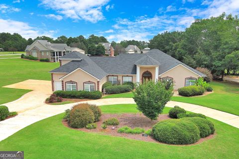 Photo of 335 Canvasback Trail, Locust Grove, GA 30248 (MLS # 10534539)
