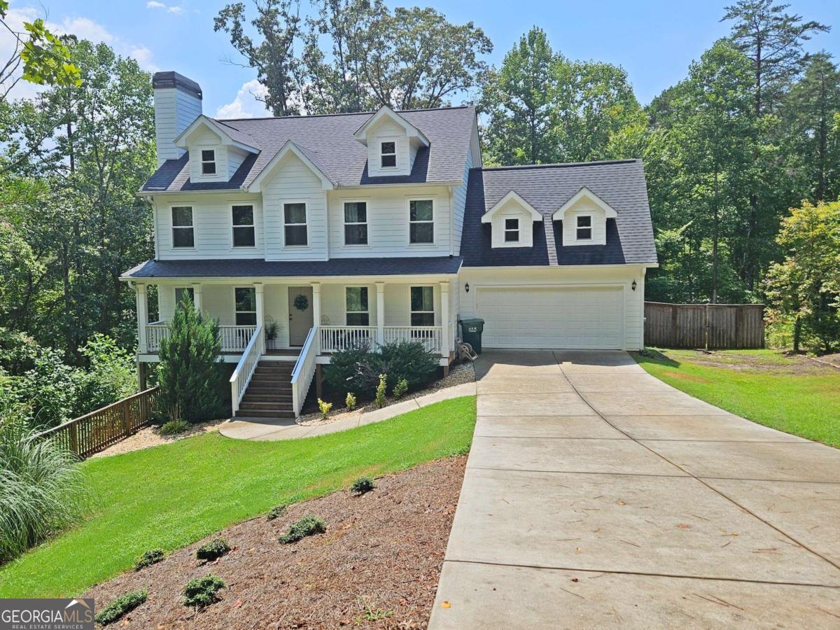 Living with convenience. Located in south lumpkin county with an easy commute to hwy 400. At only 5 years old, this home offers 6bd and 2.5ba above ground and a finished basement with 1 room, 1 full bath and a large living area(finished in 2023). Located on a private 1.14 acres with a fenced in back yard, firepit and storage shed. Walking distance to the neighborhood playground. Main living areas are all hardwood flooring. All bedrooms have BRAND NEW carpet. Basement is all LVP. Main level offers a living room with a wood burning fireplace, kitchen with granite counter tops and custom cabinets, dining area large enough to seat 8, Office/Bedroom with a closet, half bath for guests and a mudroom/laundry entrance from garage. Upstairs, you will find an oversized Primary Suite that you will love. Secondary rooms have large closets!! HOA is only $220 a year. Interior painted 7/31/2025 and septic inspected/pumped 7/29/2025 New Carpet comes with 10yr warranty. ONLY 15 minutes to downtown Dahlonega and only 2 minutes from the elementary school!!! This home is