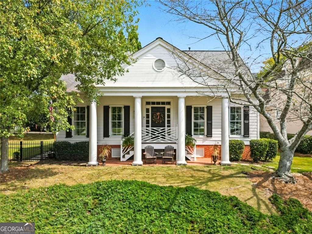 Welcome home to 301 Powers Place! This charming home is an entertainers dream nestled in the heart of East Cobb and the sought after school districts of Sope Creek ES, Dickerson MS and Walton HS. Featuring gleaming hardwood floors and a well-appointed layout that includes an open-concept chef's kitchen, complete with high end appliances and a large center island that opens to a large family room with a cozy fireplace. The primary bedroom is just steps away with a tray ceiling and spa like bathroom featuring a separate shower, soaking tub and an expansive walk-in closet. Upstairs you will find two large light filled secondary bedrooms with ample closets and their own bathroom vanities. Step outside to discover a beautifully landscaped yard perfect for relaxation and outdoor entertaining. With just minutes to shopping, restaurants, the Chattahoochee river, Sope Creek hiking trails, Truist Park/The Battery, you are never far away from your favorite places! This home is a rare find - don't miss your opportunity to make it yours because homes like this don't come around often!