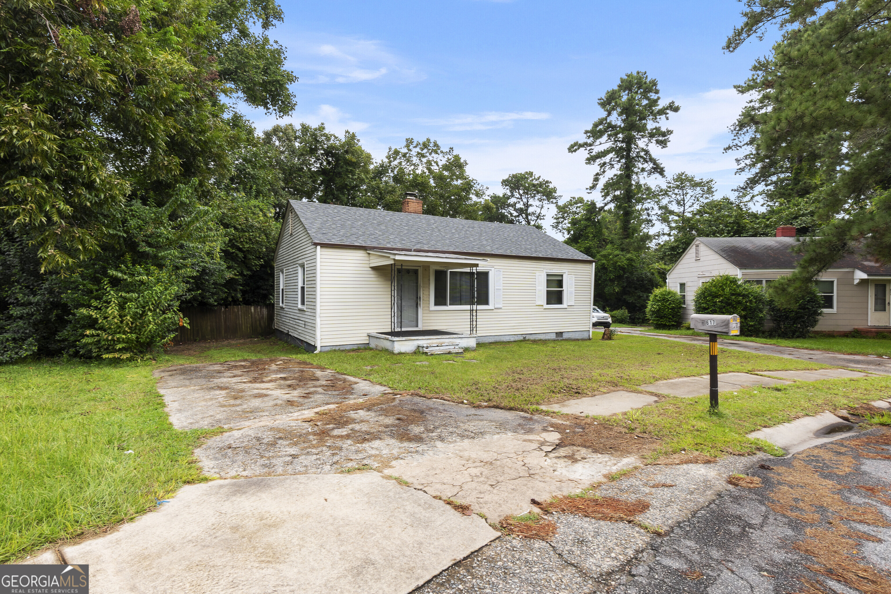 Hidden gem with almost Twice the land normally found in this neighborhood. This 2 bedroom bungalow features a covered front porch and fireplace in living room, fresh paint and an updated kitchen. HVAC unit is only a few years old. In addition, you will find a convenient laundry room off back and a brick garage for storage! The floors have recently been stained for that fresh look and bathroom has updates as well as most new vinyl windows.This lot has frontage on McArthur but also goes all the way to Pleasant Hill. This price point doesn't come along often, so take a look today!