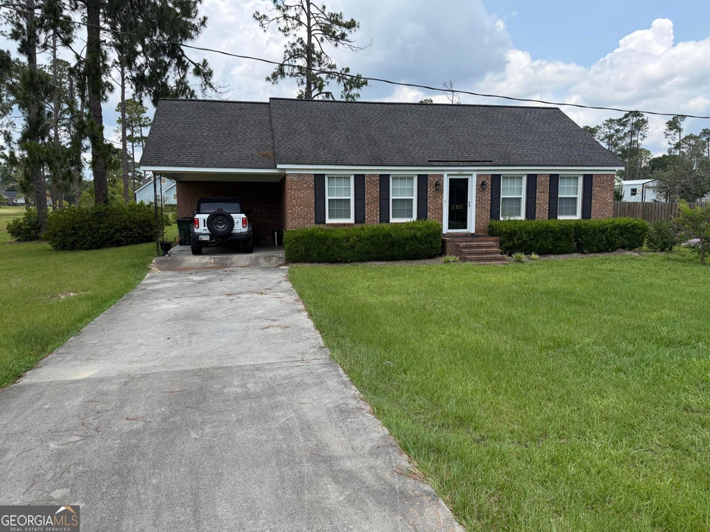Photo of 828 W Moring Street, Swainsboro, GA 30401 (MLS # 10813718)