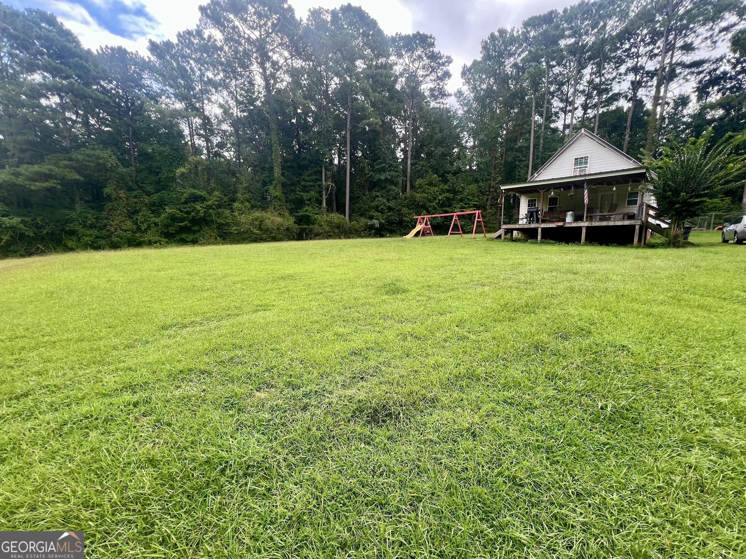 Investor Opportunity - Country Living Charm! Don't miss this incredible chance to own a property with endless potential. This 3-bedroom, 2-bath home offers the convenience of a primary suite on the main level, along with a spacious layout perfect for customizing to your needs. The large, updated kitchen is ideal for gatherings, while the open, cleared lot provides plenty of space for outdoor living or future projects. Whether you're an investor or looking for a home with room to grow, this property is ready for its next chapter! Home is being sold in as-is condition.
