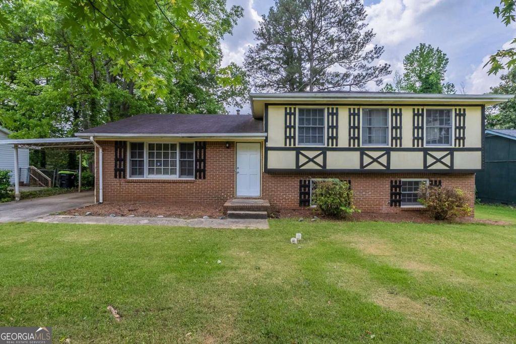 Photo of 8431 Magnolia Drive, Jonesboro, GA 30238 (MLS # 10631216)