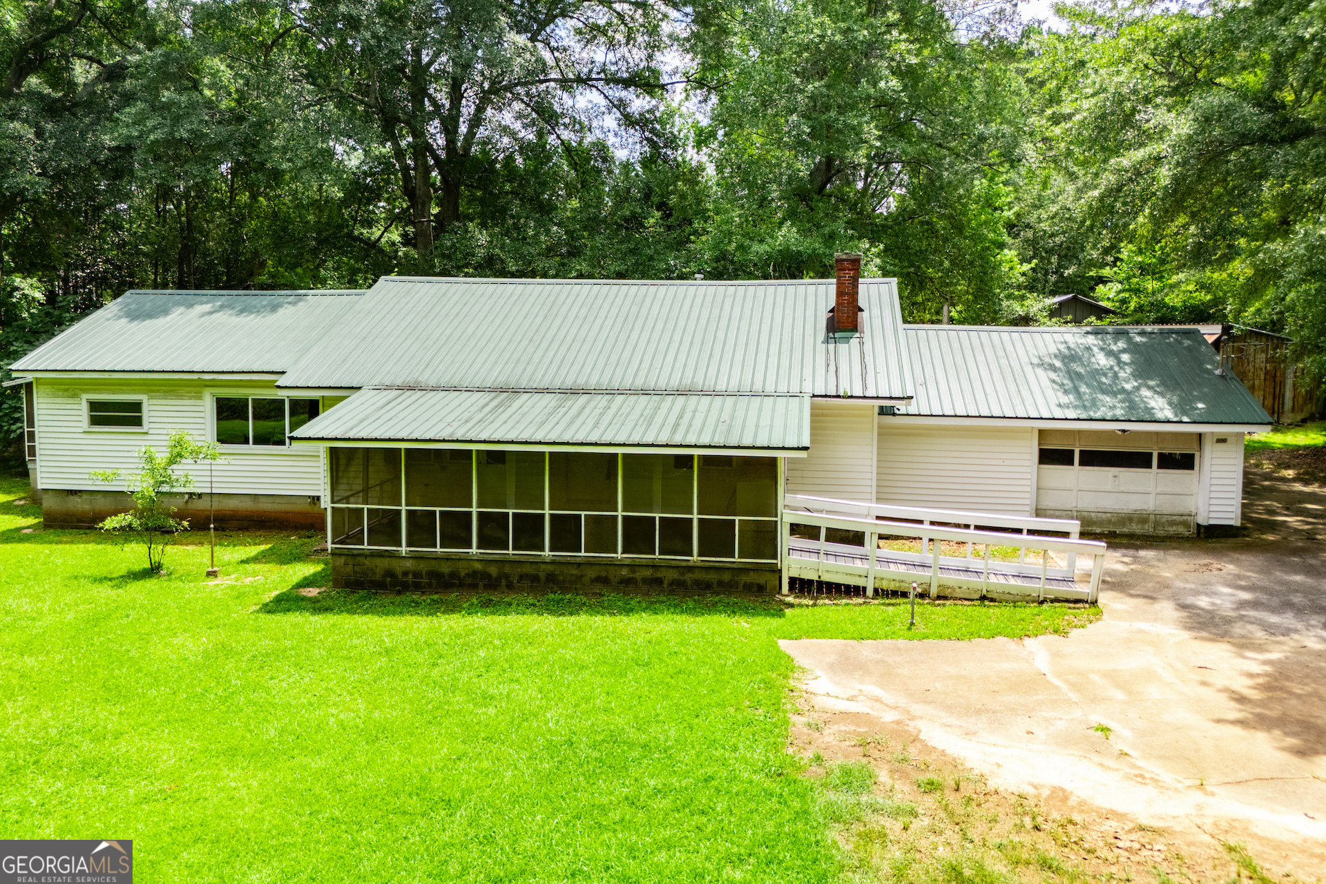 Tucked away in the peaceful and highly sought-after Roscoe area of Newnan, this 3-bedroom, 2-bath ranch-style home sits on a beautiful 1-acre lot and is bursting with potential! With solid bones and a classic layout, this home is ready for your vision-perfect for investors, renovators, or buyers looking to create their dream space in a prime location.