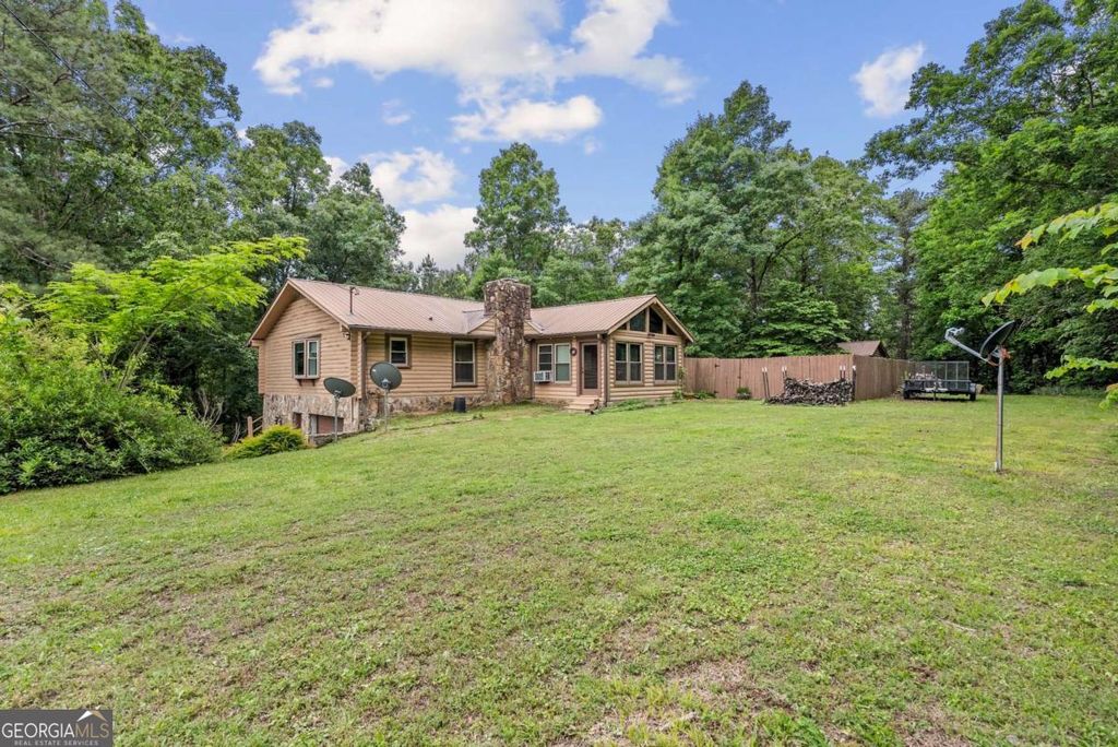 Photo of 1060 Russell Hill Road NW, Sugar Valley, GA 30746 (MLS # 10761557)