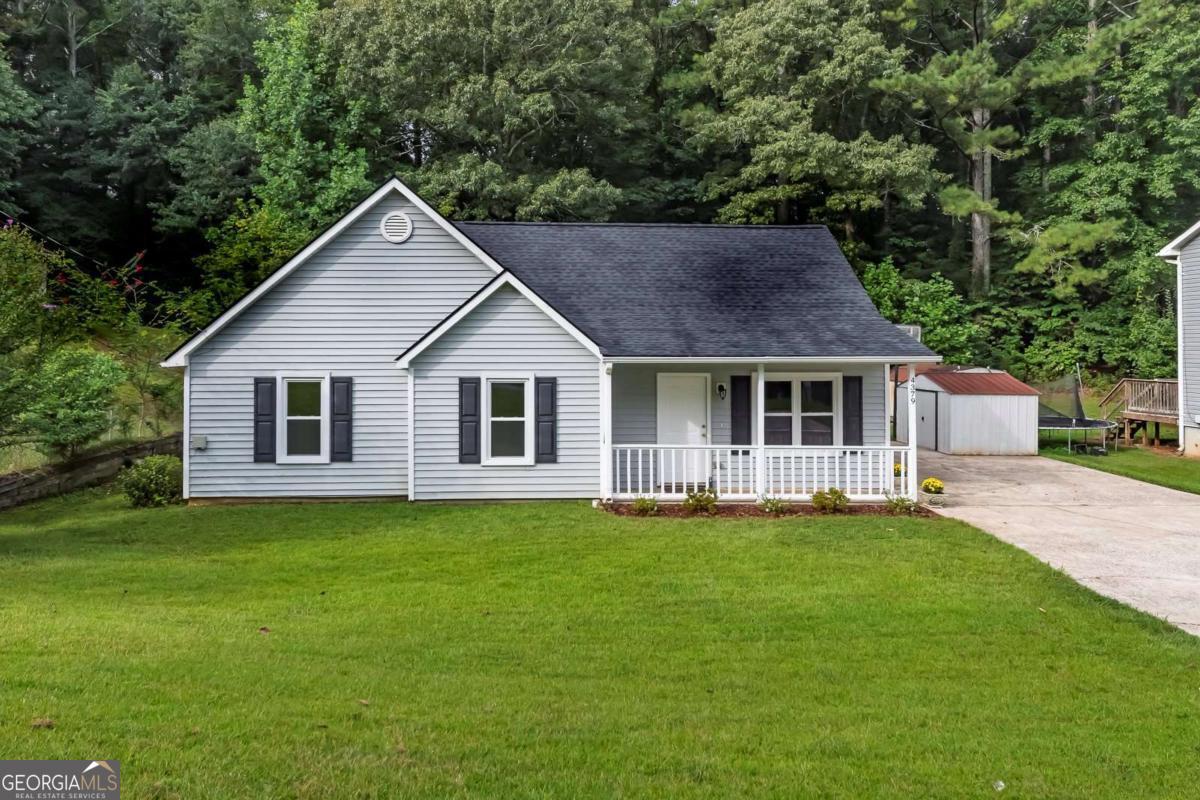 This charming, move-in ready ranch offers the perfect blend of comfort and convenience! Located within walking distance to both downtown Acworth and Logan Farm Park, you'll enjoy easy access to shopping, dining, and outdoor activities. Start your mornings in the cozy breakfast nook by the bay window or entertain guests in the spacious, open-concept kitchen and family room. Prefer the outdoors? Step out to your private patio-perfect for grilling and relaxing. Inside, you'll find 3 bedrooms and 2 full baths, along with generous storage throughout. The kitchen shines with recent upgrades, including a new range, and dishwasher, complemented by new cabinets and countertops. The refrigerator is one year old. Additional improvements feature brand-new carpet and vinyl flooring, fresh paint throughout, and all-new windows. The roof, just three months old, comes with a transferable warranty-along with transferable warranties for the windows and termite coverage for additional peace of mind. This house is investor owned and has been meticulously maintained and updated as shown in the Seller Disclosures. Don't miss your chance to make this beautifully updated home yours!