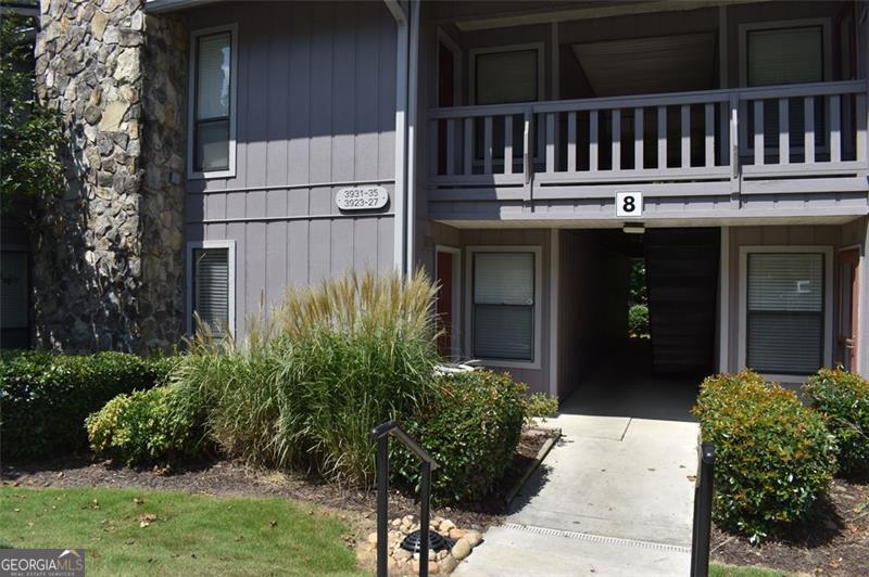 Welcome to Woodridge Condominiums in Tucker, GA - an FHA-approved community offering comfort, convenience, and charm. This thoughtfully designed 2-bedroom, 2-bathroom condo features minimal-step access-just two steps down from the parking lot-making it one of the more accessible units in the complex. Each bedroom includes its own ensuite bathroom and walk-in closet, offering privacy and flexibility. The open-concept layout seamlessly connects the kitchen to the dining room, living room, and cozy breakfast nook-perfect for entertaining or relaxing at home. Enjoy being just a short stroll away from the community pool for easy summer fun. Additional perks include one assigned parking space located close to the entrance and ample visitor parking nearby. A new water heater, HVAC system, and dishwasher have recently been installed. Don't miss the opportunity to own a well-located, low-maintenance home in a desirable Tucker condominium community.