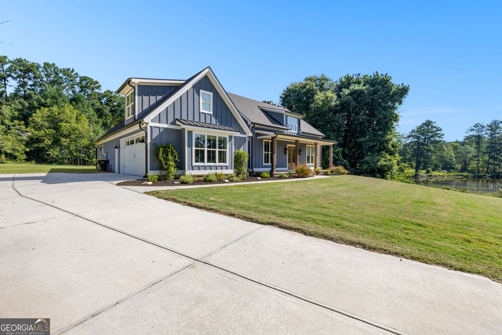 Photo of 1005 Goza Rd, Fayetteville, GA 30215 (MLS # 10842756)